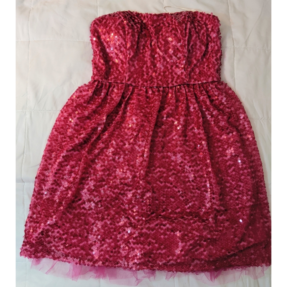 Poofy pink sequin prom dress